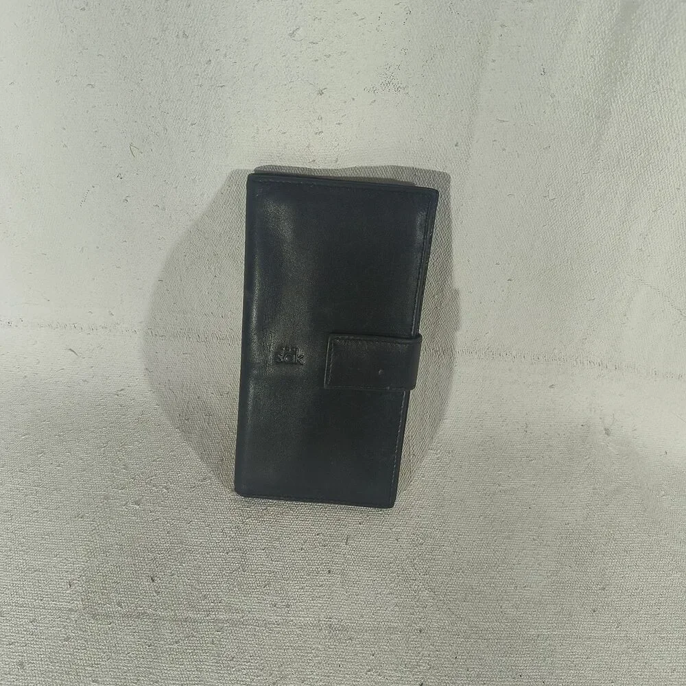 Leather Black Quad Fold Wallet by The Sak